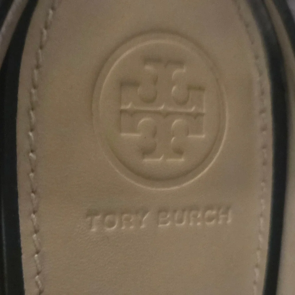 Tory Burch very good